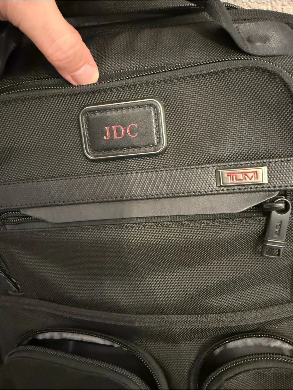 Tumi Black Backpack with JDC Patch